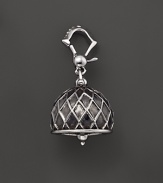 Inspired by Zen philosophy, this intricately detailed, blackened and polished sterling silver meditation bell from Paul Morelli jingles softly.