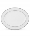 This classically designed platter is accented by a platinum rim and a delicate flourish of vine-like, white-on-white imprints with raised, iridescent enamel dots. From Lenox's dinnerware and dishes collection. Qualifies for Rebate