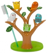 Hoo says owls only come out at night? Wise up to the new look in bath with the Give a Hoot toothbrush holder, featuring a whimsical tree shape adorned with cute owls. Holds four toothbrushes.