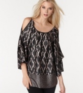 Shoulder cutouts add edge to this mixed-printed MM Couture tunic that's perfect for an easy evening look!