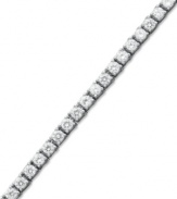 Match point. A seamless row of round-cut diamonds (6 ct. t.w.) epitomize perfection in this stunning tennis bracelet. Crafted in 14k white gold. Approximate length: 7-1/4 inches.