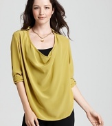 Fluttering silk charmeuse is splashed with bold color and styled into this flowing Eileen Fisher drape front top.