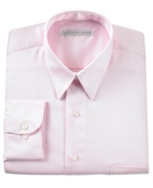 Maintain your crisp, professional look all day long in this handsome, wrinkle-free shirt. With a subtle sateen finish and classic fit, it features a point collar, chest pocket, button cuff and French placket. Round hem.