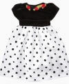 Your little ladybug will look patterned and perfect with this black and white polka dot dress from Penelope Mack. (Clearance)