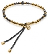 Go for the bold with this stretch bracelet from Michael Kors. Crafted from gold and hematite ion-plated mixed metal, the bracelet dazzles with fireball beads adding luster. Approximate diameter: 2-1/4 inches.