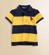 A colorful striped design accents this classic polo shirt in lightweight, knit cotton.Pointed polo collarShort sleevesButton-frontUneven vented hemCottonMachine washImported Please note: Number of buttons may vary depending on size ordered. 