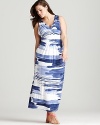 Graphic prints ruled the runways and this Karen Kane maxi makes the most of the trend. Bold blue stripes swirl across the floor-length silhouette for a style that is a walking watercolor.