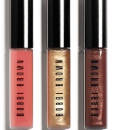 Shimmer, sparkle and shine. Bobbi's Lip Trio, is here in three beautiful shades and textures. Wear each shade alone for a quick pop of color or layer over lipstick for extra shine. Shades: Kir Sugar Shimmer, Gold Glitter Lip Gloss and Bright Pink Lip Gloss 