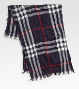 A luxurious blend of extra fine merino wool and cashmere in a signature check pattern with delicate fringed ends.Fringed ends18 x 7955% merino wool/45% cashmereDry cleanImported