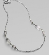 From the Iris Collection. Carved frosted rock crystal beads punctuate this sterling silver chain link style. Sterling silver Toggle closure Length, about 18 Imported 