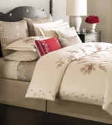 Classically elegant, the Dreamtime Floral duvet cover from Martha Stewart Collection boasts vintage-inspired floral embroidery at center and along the border. Features a soft, silk-like texture.