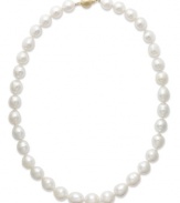 A simple style that exudes elegance. This sophisticated strand of cultured South Sea pearls (10-12 mm) strikes the perfect balance between day and evening. Features a brushed ball clasp in 14k gold. Approximate length: 18 inches.