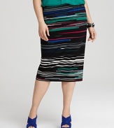 With a dramatic high waist silhouette in a shatter-stripe pattern, this ultra-stylish DKNYC midi skirt adds fashion-minded edge to your workweek look.