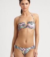 A vibrant print and classic bikini silhouette combine to create an alluring design, including a removable halter strap for style versatility. Removable halter strapBandeau topBack clasp closureSexy, ruched sides on stretch bottomFully lined80% nylon/20% spandexHand washMade in USA