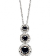 Punctuate your style with a poignant pendant. Round-cut black (1/2 ct. t.w.) and white diamonds (1/4 ct. t.w.) adorn this lovely three-stone drop necklace. Set in 14k white gold with a matching rope chain. Approximate length: 18 inches. Approximate drop: 1/2 inch.