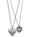 Hearts in the right place. This two-row necklace from GUESS is crafted from hematite-tone mixed metal with hematite-tone and glass crystal hearts giving you more to love. Item comes packaged in a signature GUESS Gift Box. Approximate length: 15 inches + 2-inch extender. Approximate drop: 1-1/4 inches.