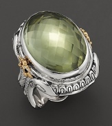 Sterling silver, touched with 14K yellow gold and detailed with a mythological motif, houses a dramatic, faceted green amethyst.