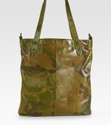 This smartly styled tote features a leather body with a camo-pattern for a military chic appeal.Zip closureTop handlesAdjustable shoulder strapsFully linedLeather15W x 17H x 1D Imported