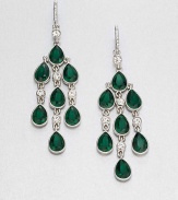 From the Emerald City Collection. Faceted teardrops in emerald green, punctuated by tiny clear stones to create delicious dazzle.Glass and plasticSilvertoneLength, about 3.25Ear wireImported