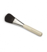 An oversized brush to apply face powder. Made of luxuriously soft black squirrel hair. Also available with a shortened handle. 