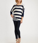 Boldly striped boatneck with long dolman sleeves, ribbed details and deconstructed, asymmetrical seaming. BoatneckLong dolman sleevesRibbed cuffs and hemLonger length hits below the hips58% linen/31% acrylic/11% nylonDry cleanImportedModel shown is 5'9½ (176cm) wearing US size 4.