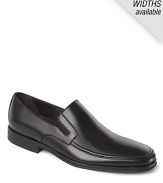 Rounded toe slip-on shoes with top stitch detailing along the toe and elastic inserts for easy slip on and off. Durable rubber sole.