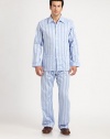 Two-piece set woven in supreme cotton with satin striped finish. Cotton. Machine wash. Imported.SHIRTButton frontChest, hip patch pocketsPANTSide elastic waistInseam, about 31