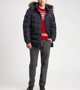 A removable hood trimmed with real coyote fur lends a flattering framework to a classic down parka style, shaped and quilted for a slimmer, modern fit.Zip frontSnap button placketAttached drawstring hoodChest welt, waist flap pocketsAbout 28 from shoulder to hemNylonDry cleanImportedFur origin: Canada