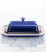 Crafted for durability and ease of use but with a traditional French design and brilliant enamel finish to redefine a table, the butter dish from Le Creuset's serveware and serving dishes collection lends smart, enduring style to everyday dining. A helpful tool in the kitchen, too!