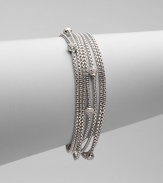 From the Petite Pavé Bead Collection. Eight box-link strands of shining sterling silver, dotted with shimmering pavé diamond beads. Diamonds, 0.49 tcw Sterling silver Length, about 7½ Lobster clasp Imported