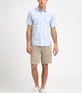 A day at the beach never looked so good; pair this vibrant button-front classic, shaped in lightweight cotton, with cotton shorts for a look that exudes effortless summer style.Button-frontChest flap pocketsCottonMachine washImported