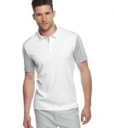 Block out boring summer style with this bold polo shirt from Calvin Klein.