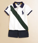 A pieced banner stripe and embroidered Big Pony add sporting heritage touches to the classic cotton mesh polo.Ribbed polo collarShort sleevesButton downUneven vented hemCottonMachine washImported Please note: Number of buttons may vary depending on size ordered. 