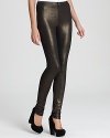 Body-con, Alice + Olivia metallic gold leggings are rich with glamour, lending decadence to your fall repertoire and drama to your evenings.