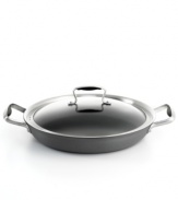 Two layers of incredibly durable and versatile nonstick combine with riveted handles and a tempered glass lid to bring the ultimate in ease straight to you. Low-fat cooking and easy cleaning become characteristics of your busy kitchen. Limited lifetime warranty.