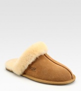 Shearling lining and trim create the ultimate in casual luxury. Round-toe design Leather sole Imported Fur origin: Australia