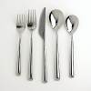 This set includes four each of: dinner fork, dinner spoon, salad fork, teaspoon and dinner knife.