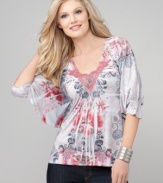 Delicate lace adds feminine charm to the flowing fabric of One World's tunic top. A perfect way to dress up your favorite jeans!