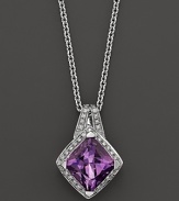 Pavé diamonds frame a glittering amethyst set in 18K white gold. 18K white gold chain.