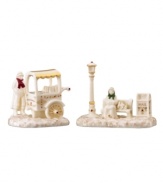 Give the bustling community of Mistletoe Park Village a place to rest and refuel with park bench and chestnut seller figurines. Crafted of beautiful ivory porcelain with gold and Christmas-color detail.