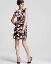 Tailored in DIANE von FURSTENBERG's signature wrap silhouette, this boldly printed dress will take you from the officee to cocktail hour without missing a fashionable beat.