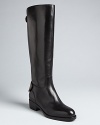 These sleekly shaped Joan & David riding boots are accented with snapped back buckles that give the style extra dash.