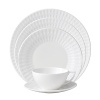 Embossed with clean, geometric patterns comprised of subtle diamond shapes, this attractive set of dinnerware is crafted in pure white bone china for a mannered elegance that complements your finest table setting.