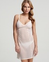 A sheer mesh nightie with lace embellishments along bust and down sides.