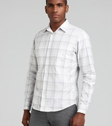 A light plaid print brings subtle texture to this sleek, slim fit button down from Theory.