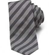 Crafted in a soft wool and silk blend, this handsome textured tie uses muted stripe tones to bring a quiet sophistication to even your casual look.