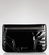 Glossy leather lends high shine and style to a wristlet with an edge. From Burberry.