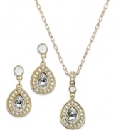 Impeccable fashion from Swarovski. This pendant necklace and earring set features pear-shaped clear crystals framed in clear crystal pave. Crafted in 22k gold-plated mixed metal. Approximate length (necklace): 16 inches + 1-1/2-inch extender. Approximate drop (both): 1-1/2 inches.