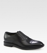 Lace-up shoe in leather with micro diamante trimmed cap toe.Rubber soleMade in Italy