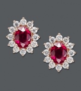 Add a little life to your look in red-hot hues. Effy Collection's oval-cut ruby (3-3/4 ct. t.w.) and round-cut diamond (1-5/8 ct. t.w.) earrings gleam in a 14k gold setting. Approximate length: 11/16 inch. Approximate width: 1/2 inch.